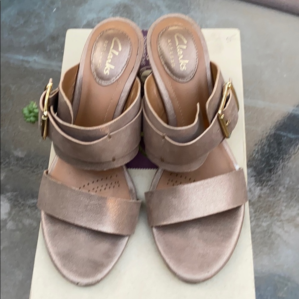 Champagne leather Clark’s sandles.